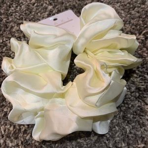 Whiteish yellow colored scrunchie